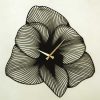 Elegáns fekete dekoratív fém falióra, 70 x 70 cm | 100% acél, 1,5 mm vastag | Csendes mechanizmus, könnyű 1,7 kg | Tökéletes otthoni és irodai dekorációhoz